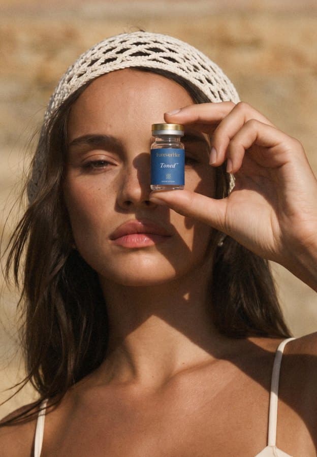 Holding a Toned vial in the sun